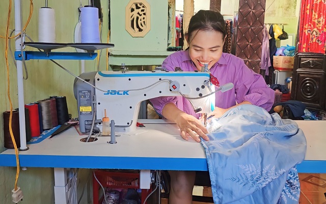 women with sewing machine