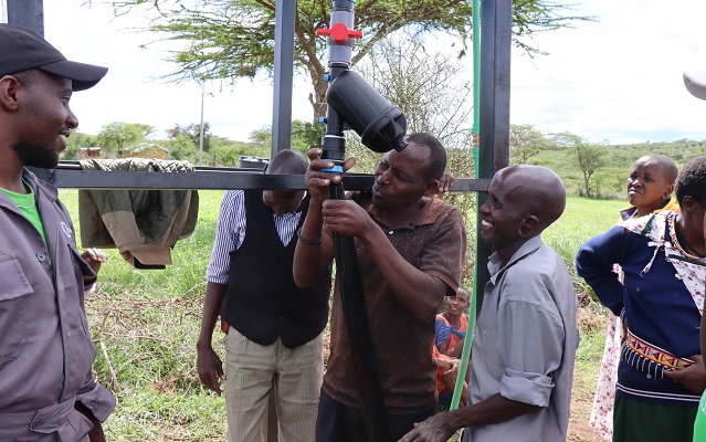 Instruction on how to link the primary drip pipe from the filter at the Ildamat Farm, Kajiado