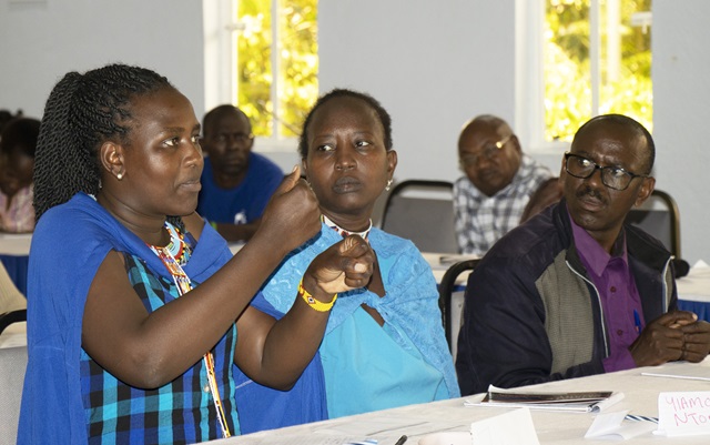 Jackline contributing to the discussion by use of sign language ,on how Person with Disabilities can be intergrated in Agriculture in Kajiado County, Kenya..jpg